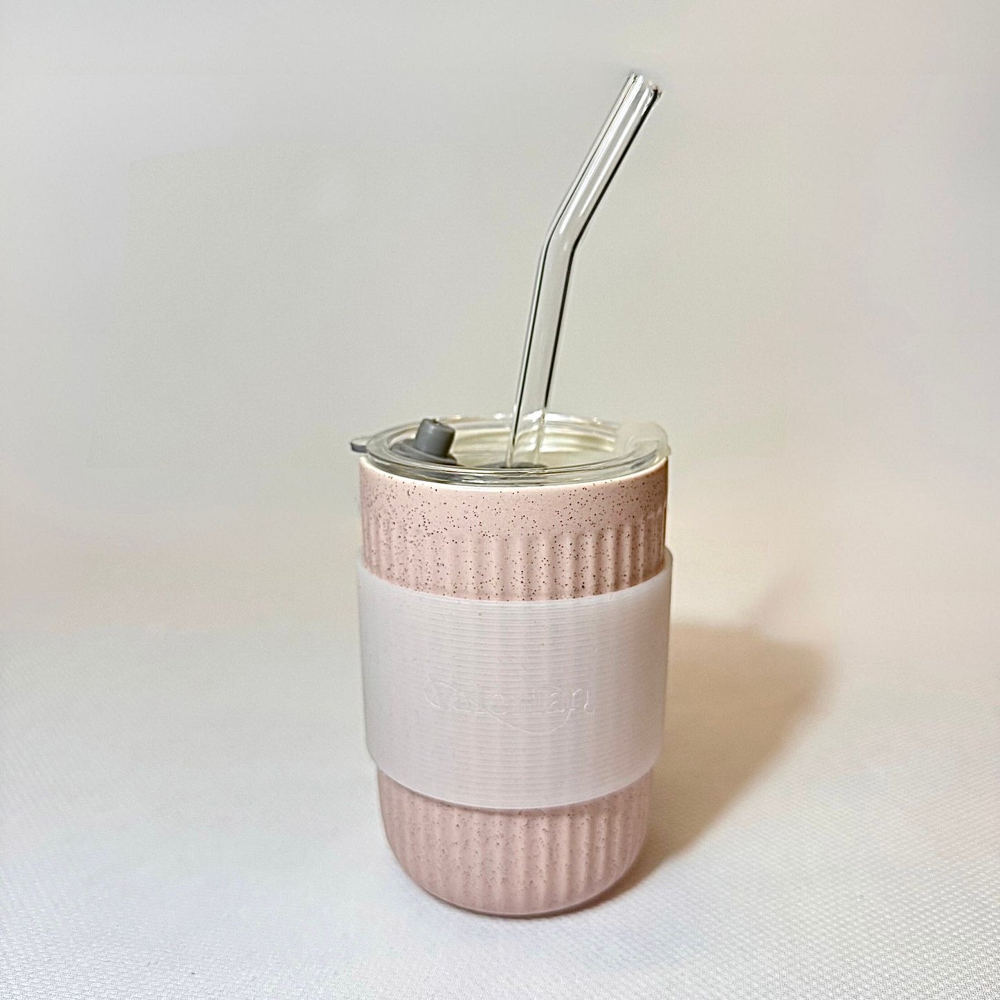 Ceramic cup with straw