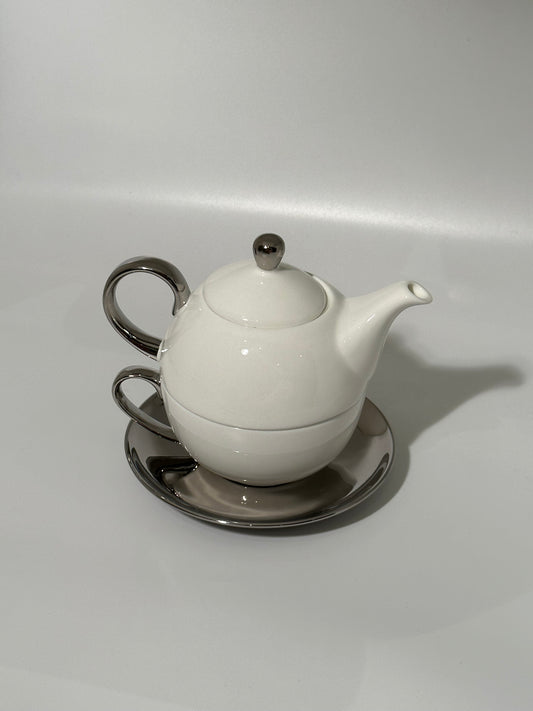 Teapot with cup